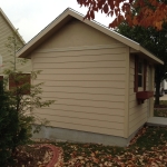 Rear view of Stucco gables and lap siding